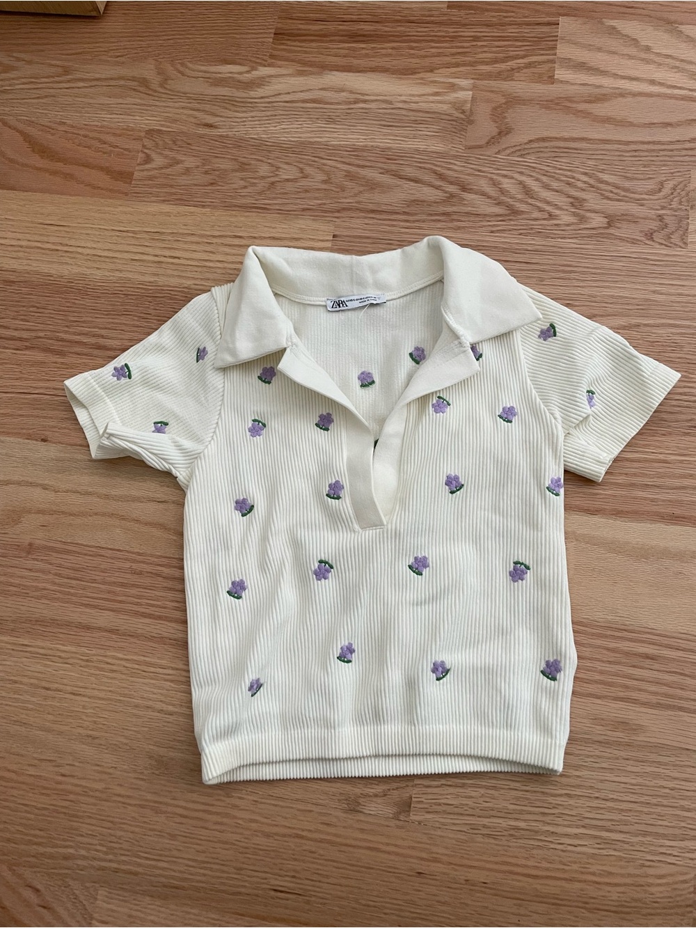 Zara women’s Cream Polo Top with Purple Floral Embroidery